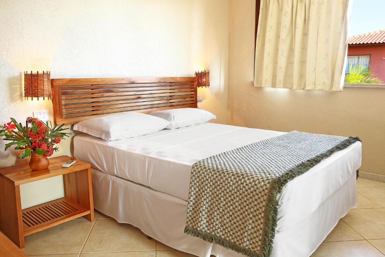 La Torre Resort All Inclusive Porto Seguro Exterior foto A bed with a bedsheet
